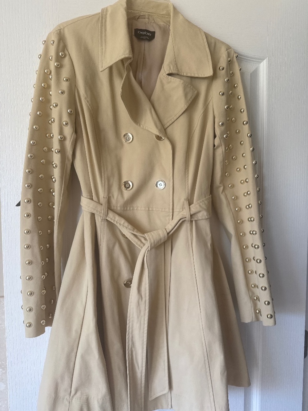 Bebe trench coat with gold studs